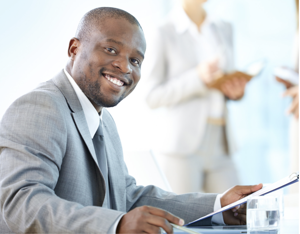 Man smiling while working