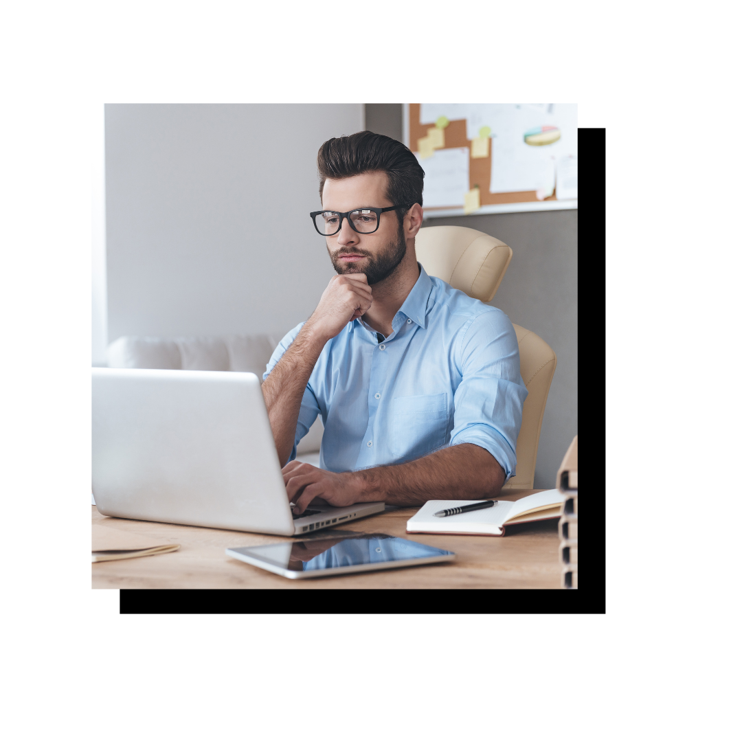 Motivated and productive man on laptop 