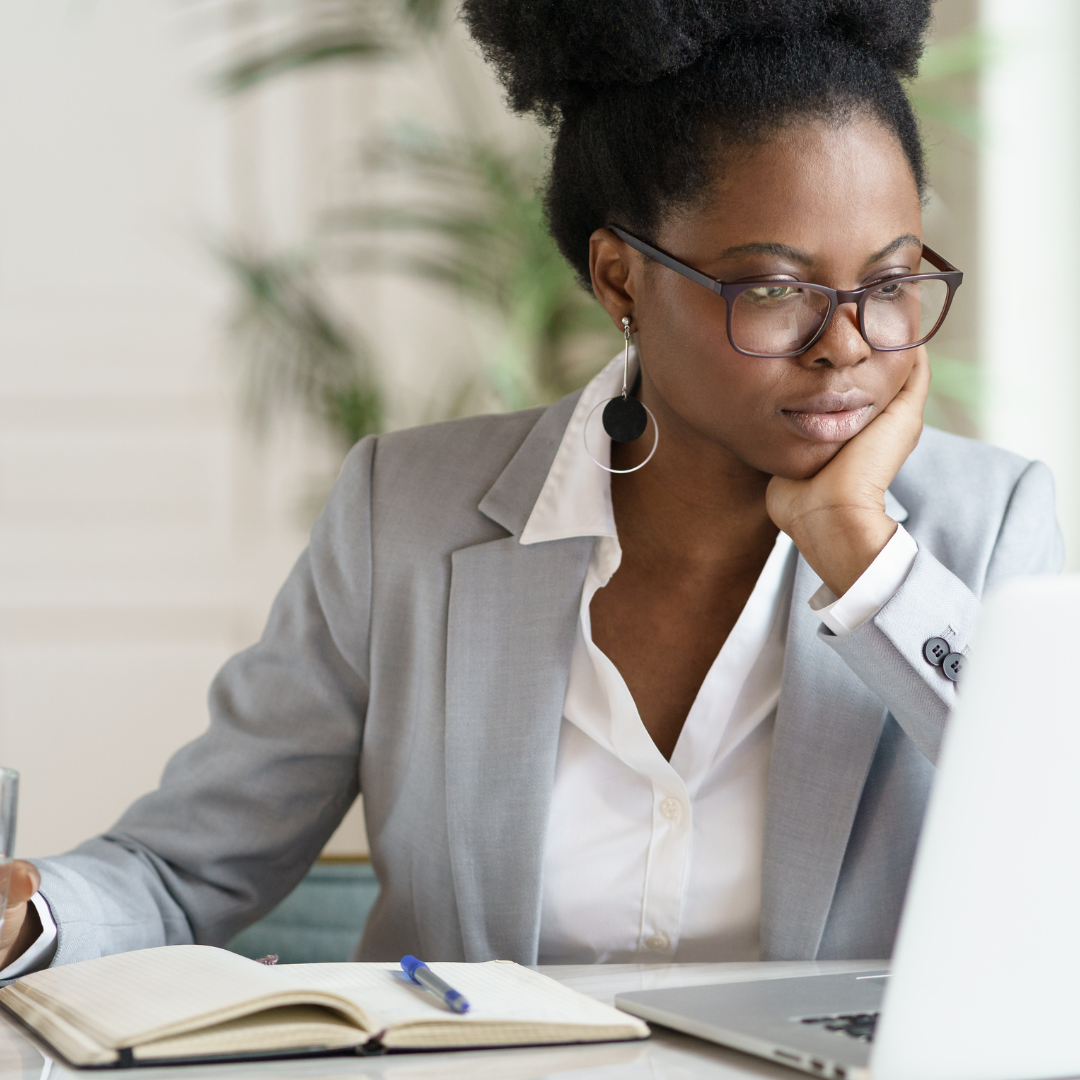 Woman with ADHD trying to focus on her work